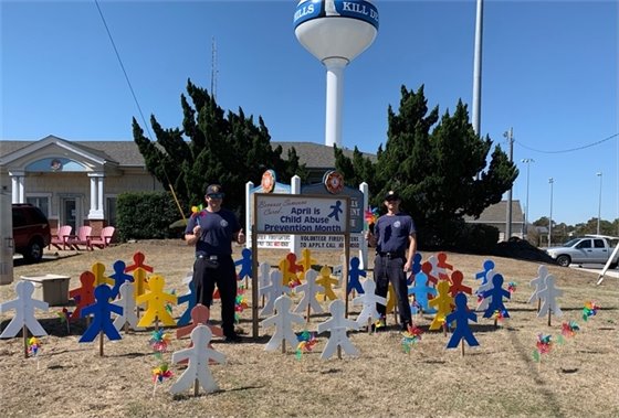 Child Abuse Prevention Month  The Town of Kill Devil Hills recognizes the importance of families, caregivers, and communities working together to provide safe, stable, and nurturing homes and communities for our children to grow and develop in a healthy manner.  In an effort to enhance awareness of child abuse, the Kill Devil Hills’ Fire Department installed pinwheels and cutouts of children at its station. They will host the display for the month of April. The pinwheel signifies the bright future all children deserve and the belief that getting it right early is less costly than trying to fix it later.  Report concerns of child abuse by calling the Dare County Department of Health and Human Services at 252-475-5500, 8:30 - 5:30 p.m., M-F. In the event of an emergency dial 911.