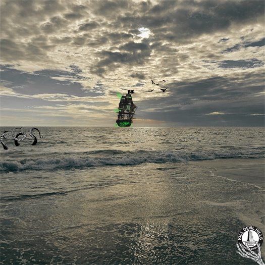 An image of the beach with Halloween graphics featuring a ghost ship and sea monster