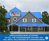 Image of Town Hall with text that reads: Applications now accepted  to fill the commissioner vacancy on Kill Devil Hills Board of Commissioners